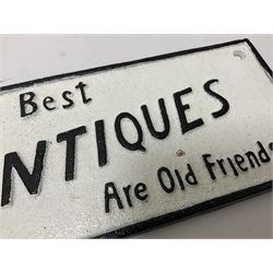 Cast iron sign 'The Best Antiques Are Old Friends', L25cm