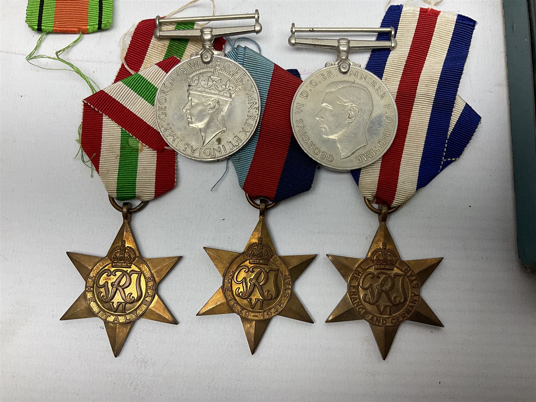 WW2 group of five medals comprising Defence Medal, 1939-1945, Italy Star, French and German Star and 1939-1945 star, with miniatures  