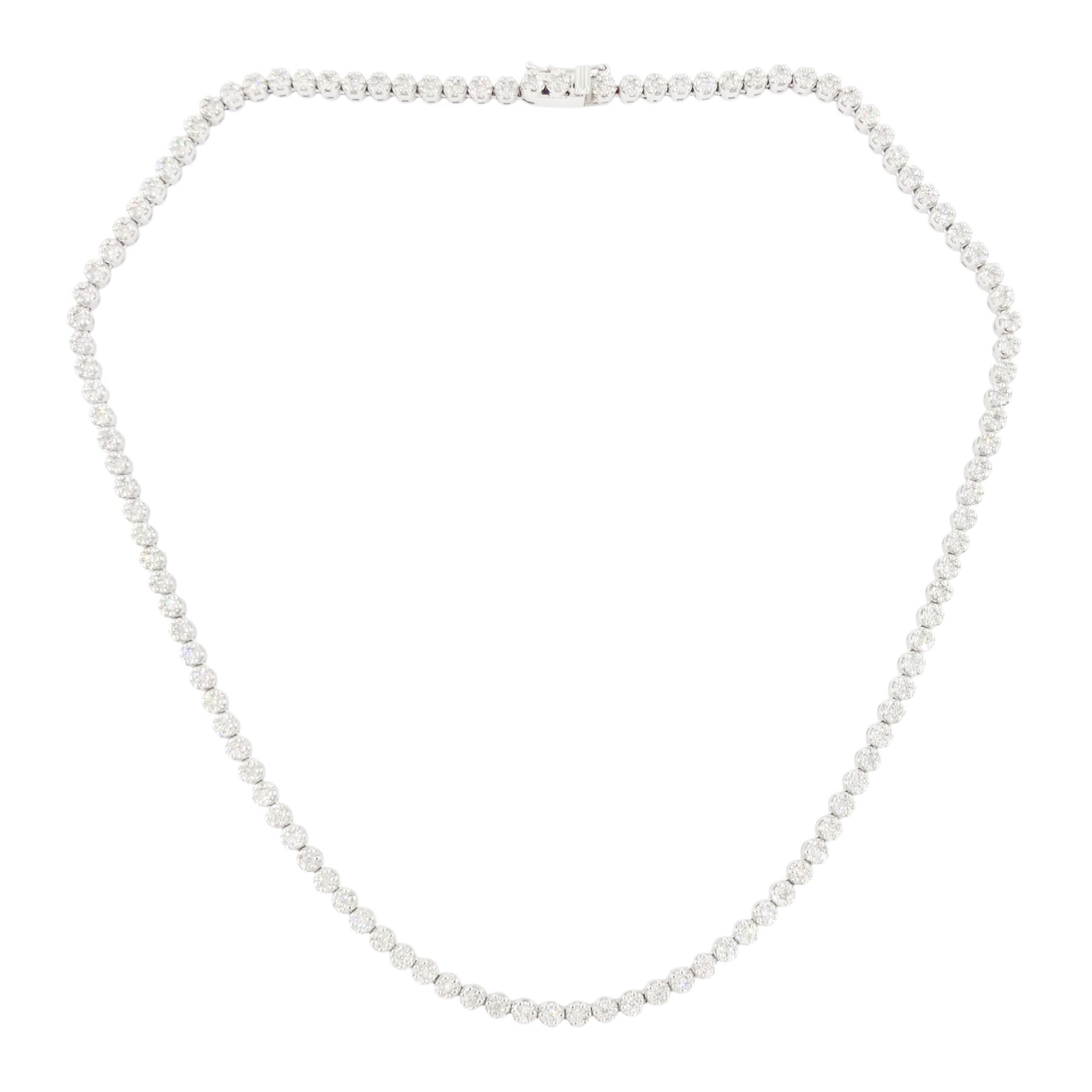 18ct gold diamond necklace, one hundred fourteen clusters, each set with seven round brilliant cut diamonds, hallmarked, total diamond weight 5.00 carat, boxed with certificate