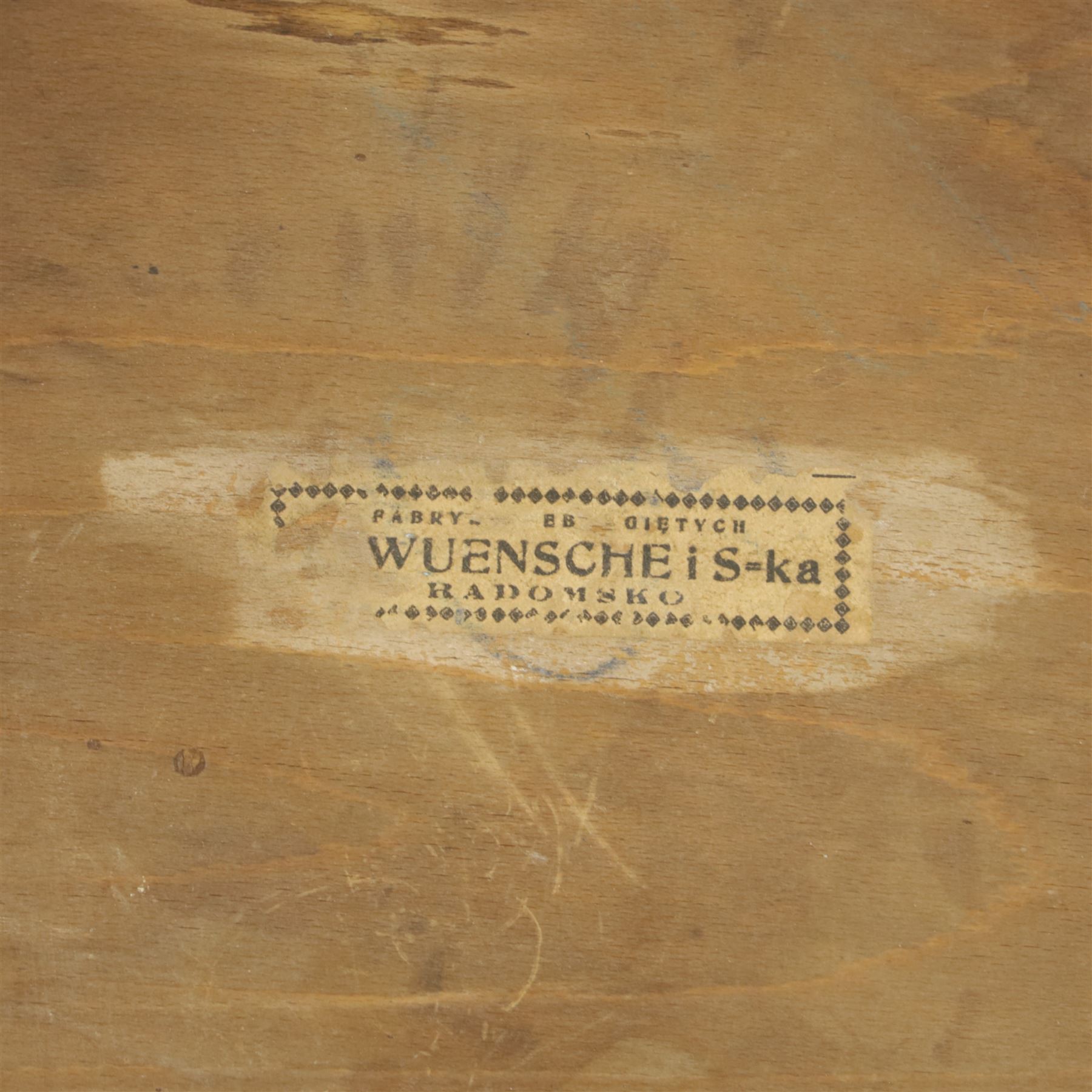 Set of three bentwood café chairs in the manner of Thonet, including a pair of side chairs (W 37cm, D 45cm, H 86cm) and a matching armchair (W 70cm, D 46cm, H 81cm), each with pressed seat decoration and continuous loop backrest