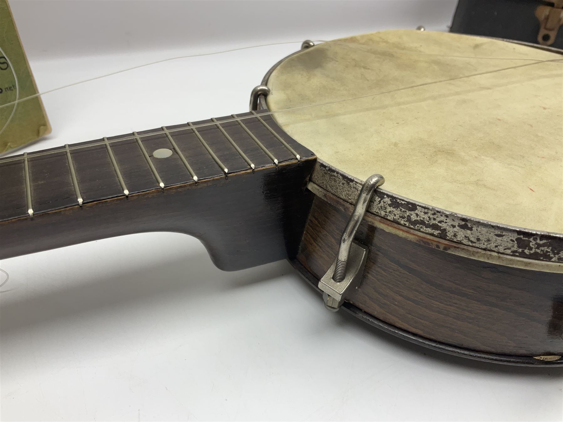 George Formby banjolele with metal plaque to headstock L55cm; in carrying case with instruction booklet.