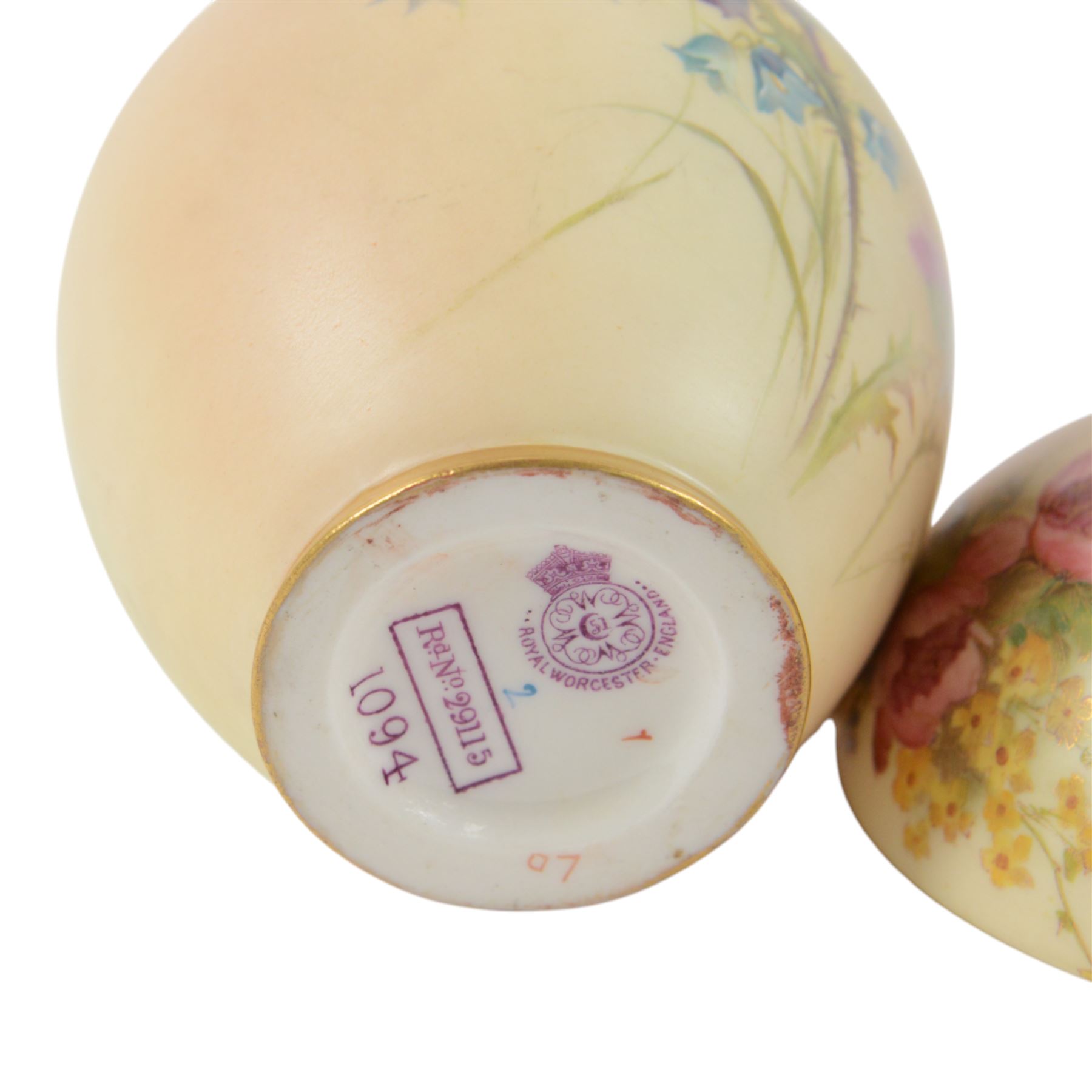 Royal Worcester Blush Ivory, comprising reticulated pot pourri jar upon eagle support, with black printed mark beneath, twin handled posy vase, shape no. 1556 with pink fluted body and puce mark beneath and three jugs, including shape no. 1018 example with bird mounted handle and two shape 1094 examples, all decorated with floral sprigs and with puce marks beneath, tallest H21cmn