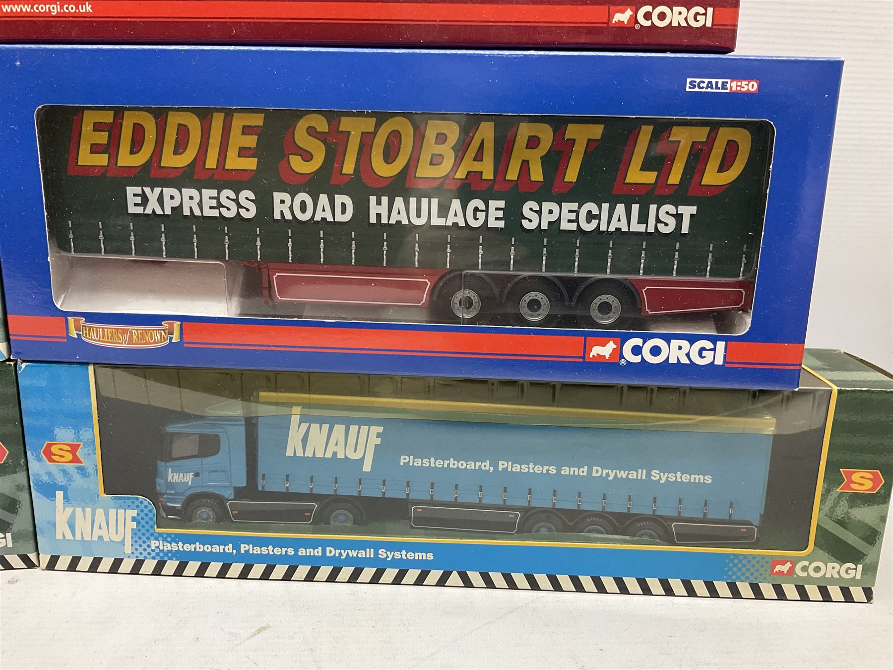 Corgi Eddie Stobart - Hauliers of Renown CC19904 Curtainside Trailer; two limited edition Scania R Curtainside CP18110 & CP18111; Roadscene CC18106 Scania R Curtainside; and three customer livery lorries CC86603  Sunpride, CC86604 Knauf and CC86702 The Mirror; all boxed (7)