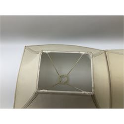 Pair Oriental table lamps decorated with birds in a tree with fruit, on a red ground with a gilded base together with cream lampshades H57cm, without lampshade. 