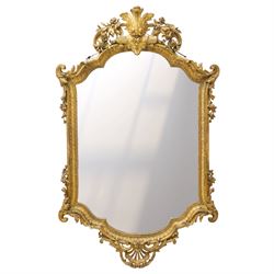 Victorian giltwood and gesso framed ornate wall mirror, the protruding cartouche pediment ...