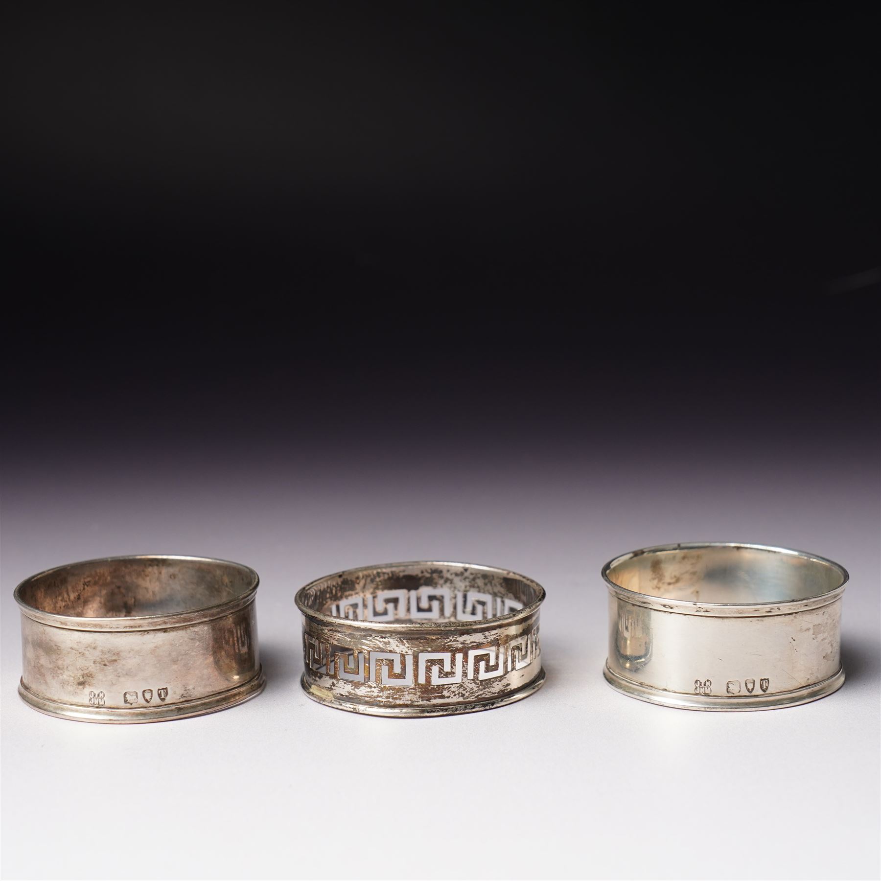 Five George IV Scottish silver table forks engraved with initial Glasgow 1829 Maker G Thomson, one German silver (800) spoon and five silver serviette rings