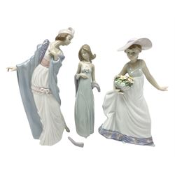 Three Lladro figures of ladies comprising 'The Flirt' model no 5789, 'Ingenue' model no 5487 and 'Carefree' model no 5790, all with boxes
