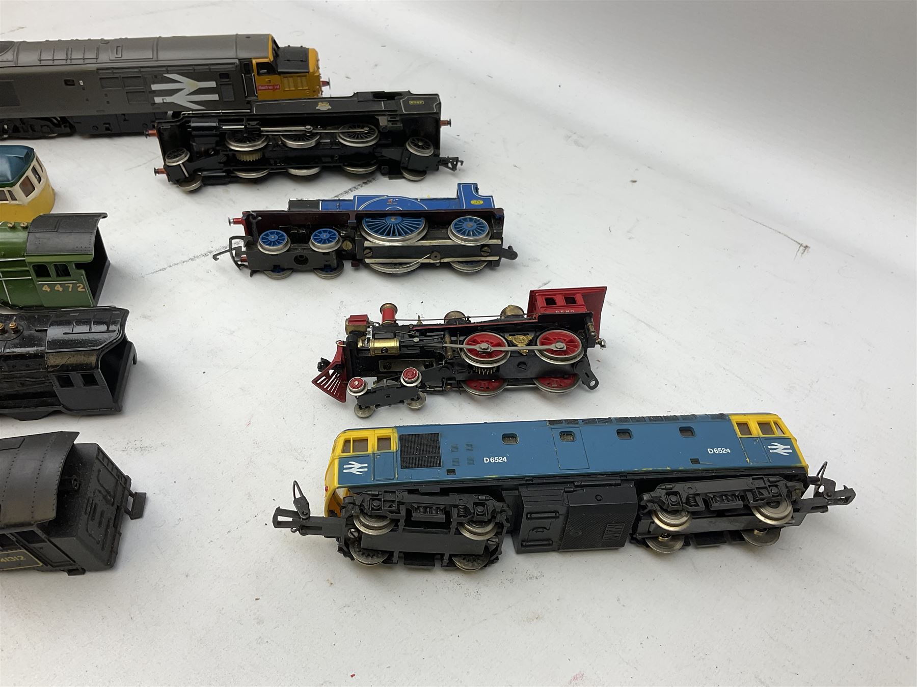 '00' gauge - Tri-ang 'Caledonian Single' Class 4-2-2 locomotive and tender; Hornby Class 37 Diesel (English Electric Type 3) locomotive No.37063; Airfix Class 61XX 2-6-2 Prairie tank locomotive No.6167; Pocher Italy American style 4-4-0 locomotive 'Reno'; and a quantity of part locomotives, spare parts etc; all unboxed