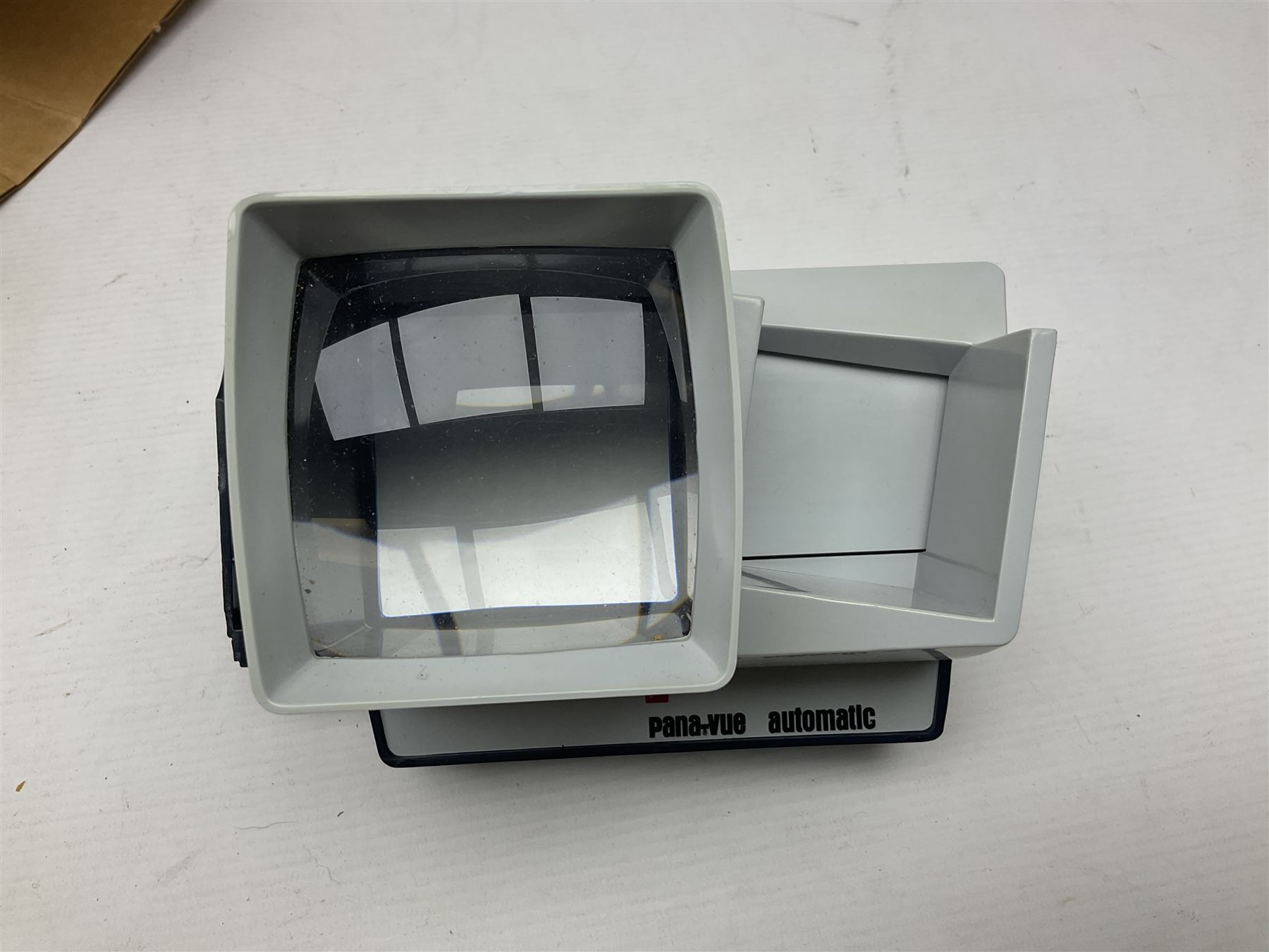 Pair of French binoculars by A.Tubeue Paris, together with three other pairs of binoculars including Telemax 5, Tasco Zip and Hanimax examples and a Panavue automatic slider viewer