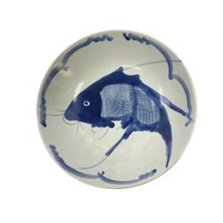 Chinese Kangxi style blue and white dish, painted with wide strokes of underglaze blue with a carp under a simple line border, D20.5cm 