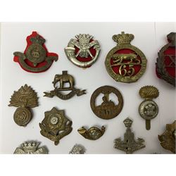 Over thirty regimental cap badges for fusiliers, Yorkshire interest, Light Infantry etc including Royal Scots and Welsh fusiliers, Durham L.I., KO Yorkshire L.I., Oxford & Bucks L.I., Green Howards, East Yorkshire, West Riding, York North Riding etc 
