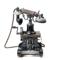 Early 20th century L M Ericsson & Co Skeletal table telephone, the earpiece impressed No.28, with black painted frame and possibly original wires, H29cm