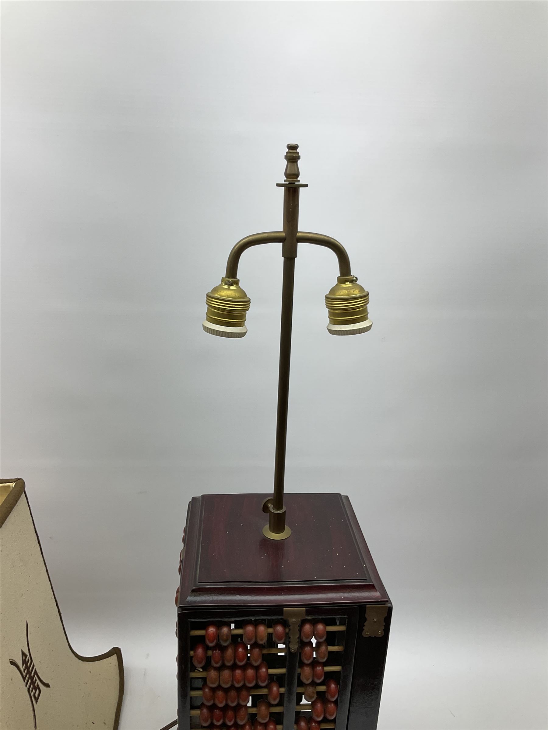 Vintage Chinese abacus table lamp, with double light fitting, and cream fabric shade decorated with characters, overall H73cm
