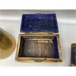 Swiss mountain hunters tobacco pipe with a horn mouthpiece, metal hinged pierced lid and brass chain, the black coated body adorned with small metal cow flowers, together with two other pipes and case, brass mounted horn, brass mounted bone box, carved mother of pearl handled knife and fork and brass jug