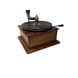 Early 20th century oak cased gramophone, the motor marked 'Garrard No.20 REF No.1030', with ribbed oak horn, base 30cm square; with one 78rpm record and Columbia tin of needles