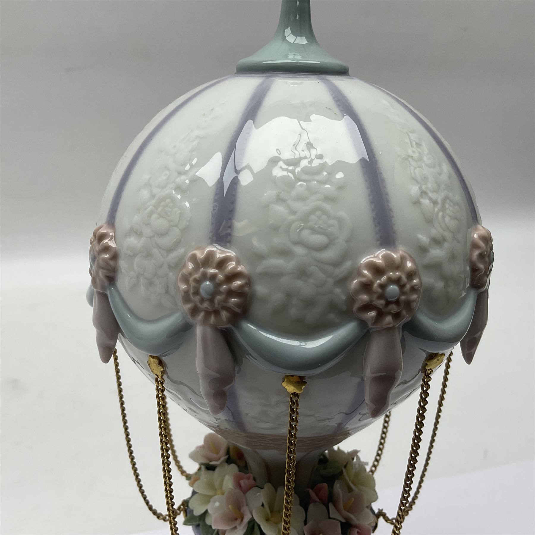 Lladro Flying High, modelled as a hot air balloon, with brass chains to suspended blossom filled basket, no 6523, with original box, H23cm