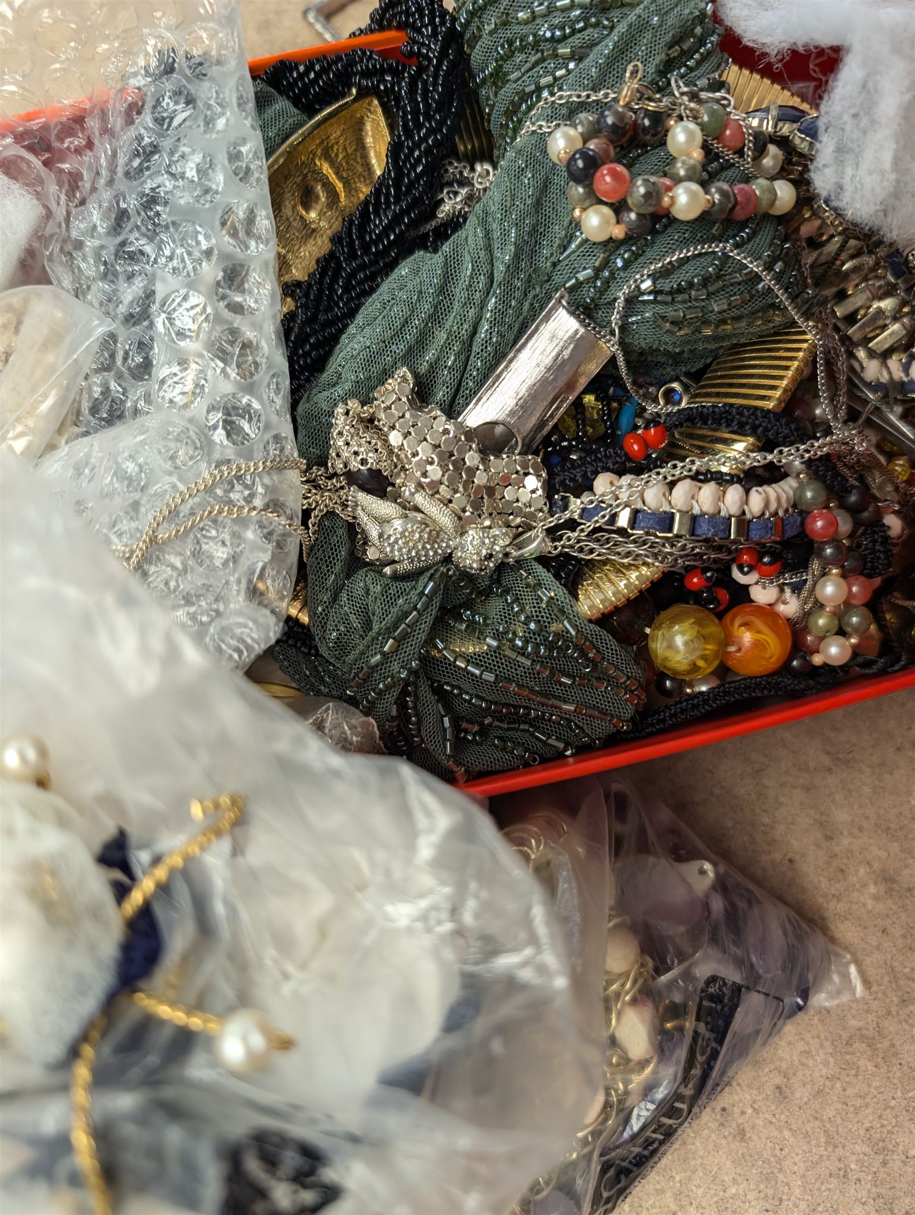 Collection of costume jewellery, including Monet earrings, beaded necklaces, rings etc