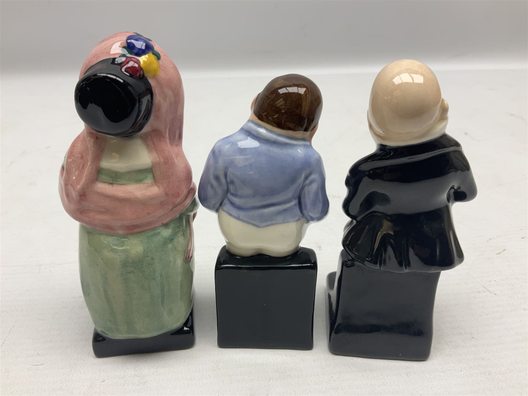 Sixteen Royal Doulton Charles Dickens figures, to include Oliver Twist, Fat Boy, Fagan, Stiggins etc, all with printed marks beneath