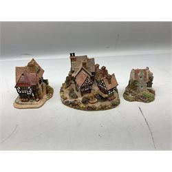 Eleven Lilliput Lane cottages from the British / English Collection, to include Tudor Court, Swan Inn, Culross House etc all boxed with deeds