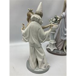 Four Lladro figures, comprising Touch of Class no 5377, Boy Student no 4517, Ocean Beauty no 5785 and Carnival Couple no 4882, largest example H45cm