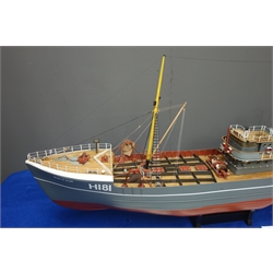  Part wooden scale model of the Hull Fishing Trawler Man 'O' War H.181, twin-masted with single screw, on stand, L117cm H55cm. - Built 1937 by Cochrane & Sons Selby as GY.396, became HMT 1939 as Anti-Submarine FY104   