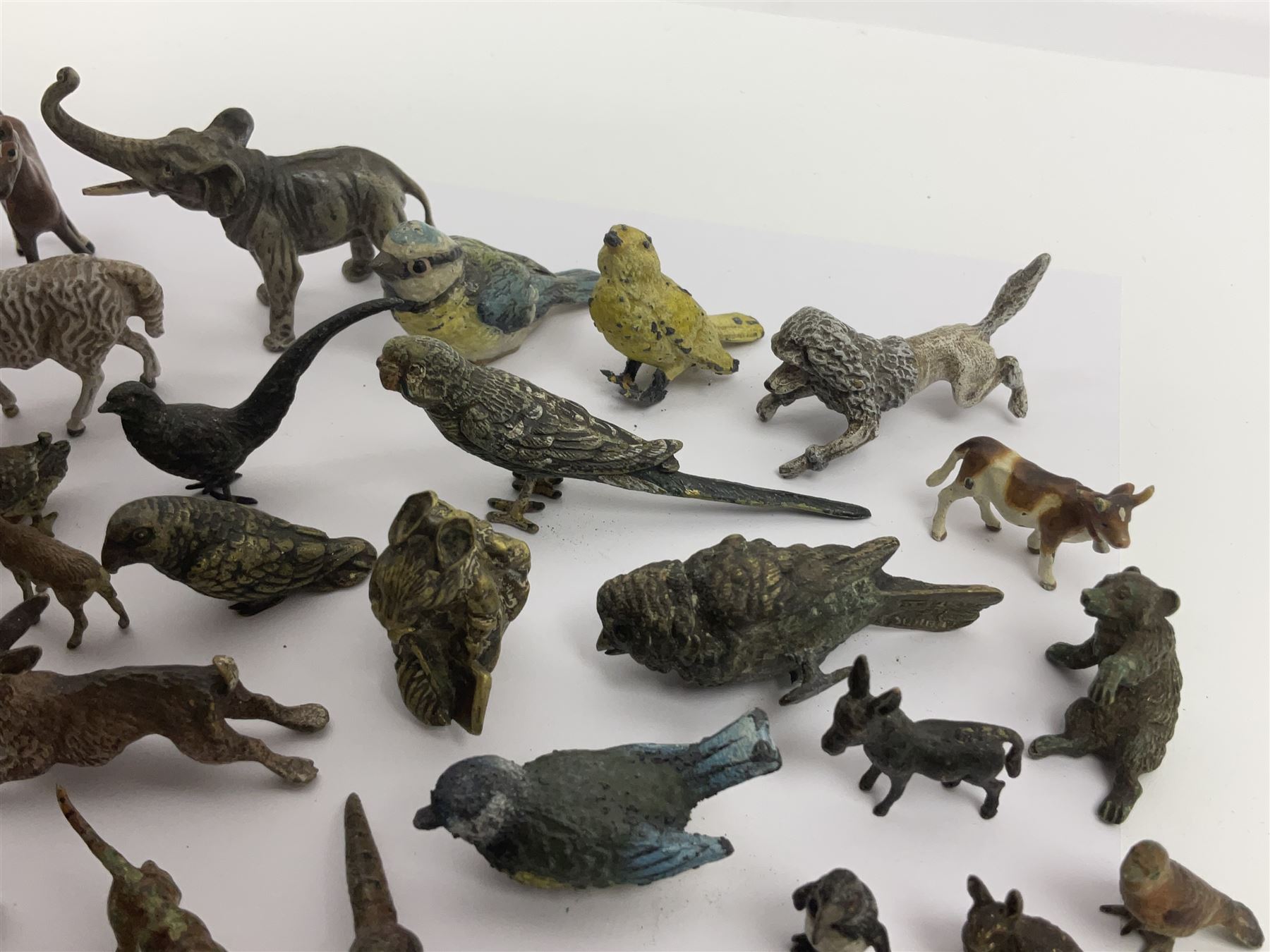 Collection of miniature cold painted bronze and similar animals, to include birds, sheep, horses etc 