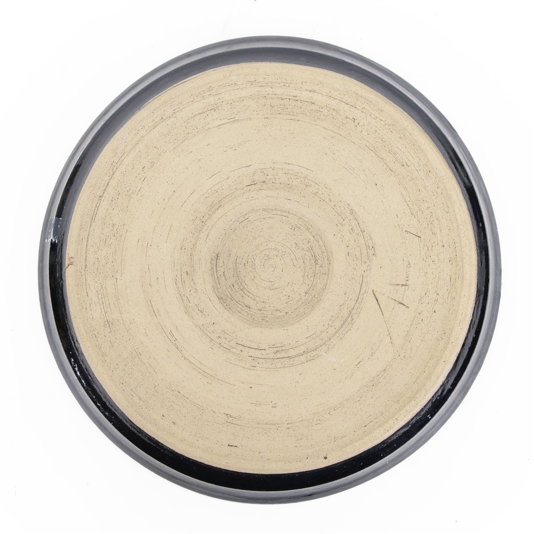 John Egerton (c1945-2024): studio pottery charger, decorated with a moorland view D32cm