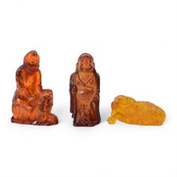 Two clear quartz figures of Buddha, together with five resin figures, including pair of zodiac balls, ram and Buddha, tallest H13cm