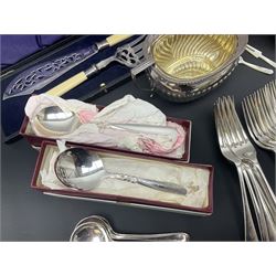 Mother of Pearl handled cutlery, with silver ferrules, comprising six fish knives and forks and six fruit knives and forks, the ferrules hallmarked Yates Brothers, Sheffield 1905, together with silver plated Edwardian three piece tea service and other flatware 
