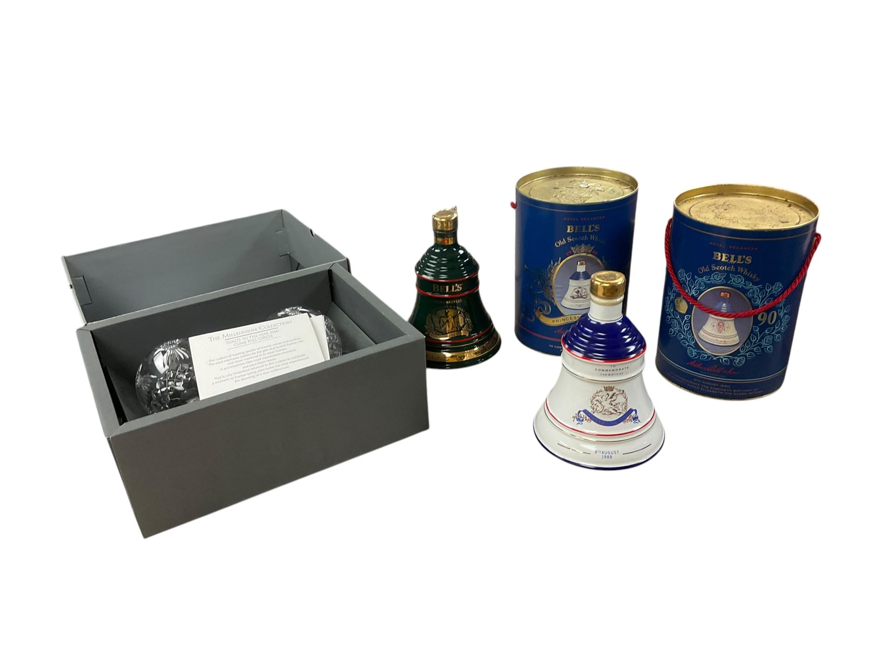 Four Bells whisky decanters, and two Waterford Millennium Collection Toasting Goblets