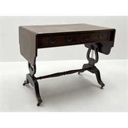 20th century walnut drop leaf sofa table, shaped drop leaf top over two drawers, on lyre shaped end pillars with splayed reeded supports joined by turned stretcher