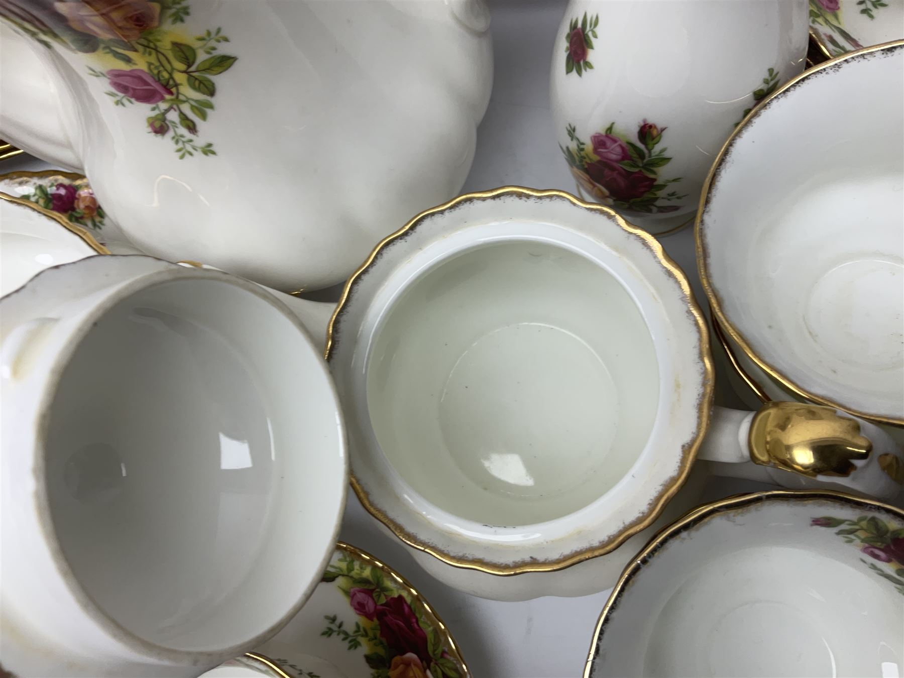 Royal Albert Old Country Roses pattern part tea and dinner service, including coffee pot, miniature teapot and stand, eight dinner plates, cake stand, sauce boat etc 
