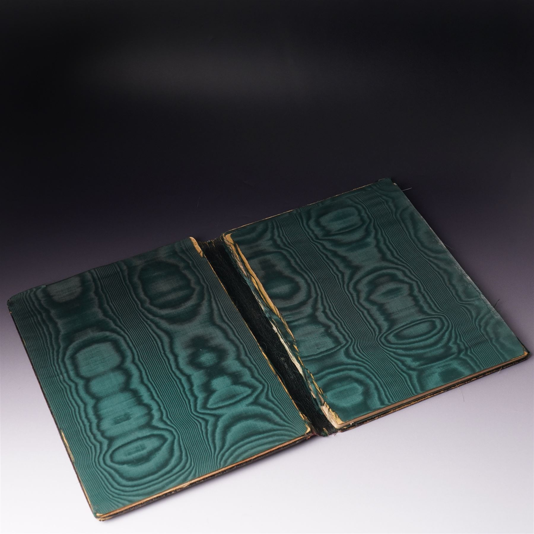 Edwardian silver folding desk blotter with watered silk interior and embossed decoration engraved with initial 'N' 27cm x 20cm Sheffield 1904 Maker Walker & Hall