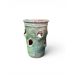 Set of five weathered terracotta strawberry pots, circular form with ribbed top