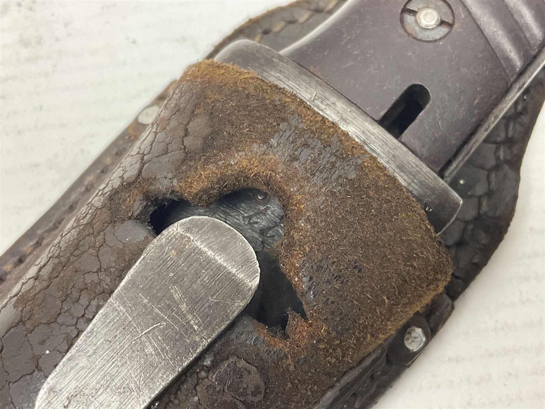 WWII German K98 Mauser bayonet by E. & F. Horster, the 24.5cm fullered blade marked 43aSW for 1943, numerous inspection marks to blade and pommel, bakelite grips and bluing to metal parts; in steel scabbard with corresponding numbers and leather frog L42cm overall