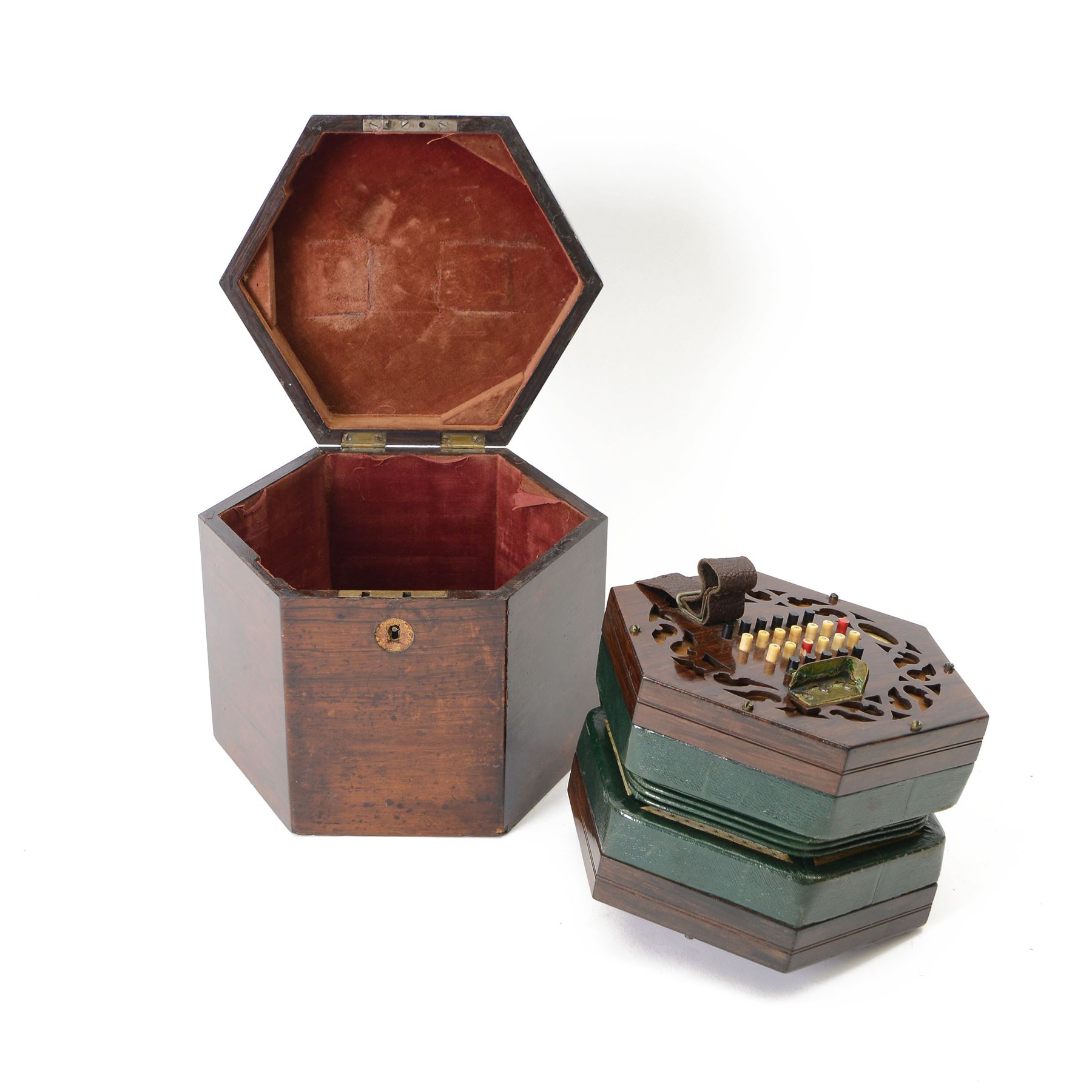Wheatstone Concertina - in a hexagon velvet lined Rosewood case, with hexagonal fretted rosewood ends, four fold bellows 48 buttons and leather finger straps, oval plaque with makers name 