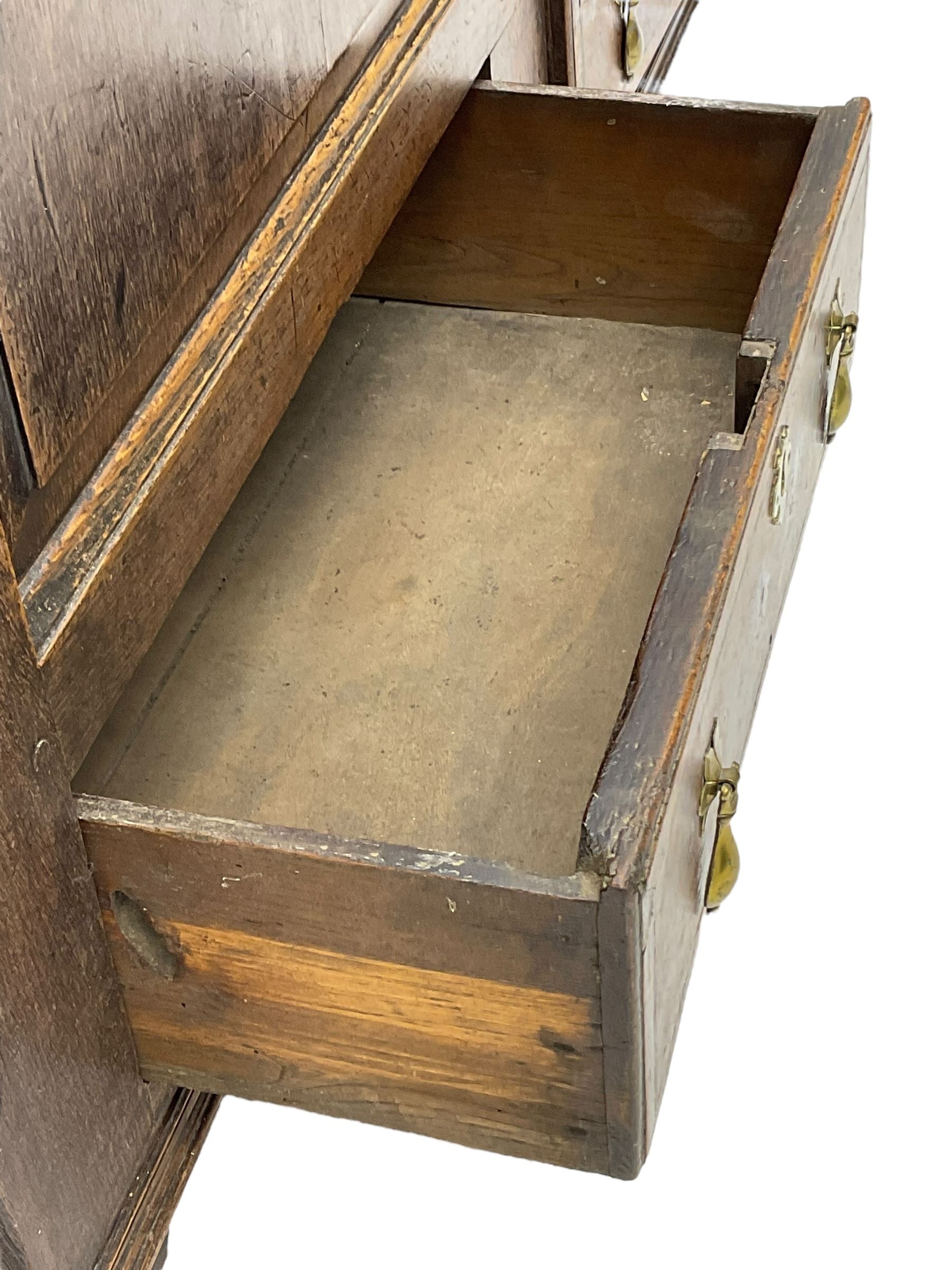 18th century oak mule chest, moulded hinged lid over panelled front, fitted with two moulded drawers