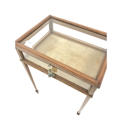 Small Edwardian satinwood bijouterie cabinet, hinged bevelled glass lid to top with moulded frame, square tapering supports with spade feet, W51cm, H71cm, D39cm