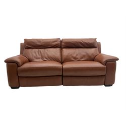 Three electric reclining sofa upholstered in tan leather, with matching reclining armchair and footstool