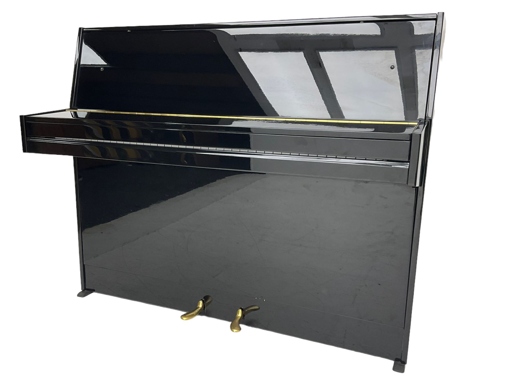 Steinmayer - contemporary upright piano in a black lacquered case, iron over strung frame with an underdamper action, internally operated hammer mute, sustain and Una-corda pedals, with a  6 octave 73 key compass, serial number '551051128'. L122cm