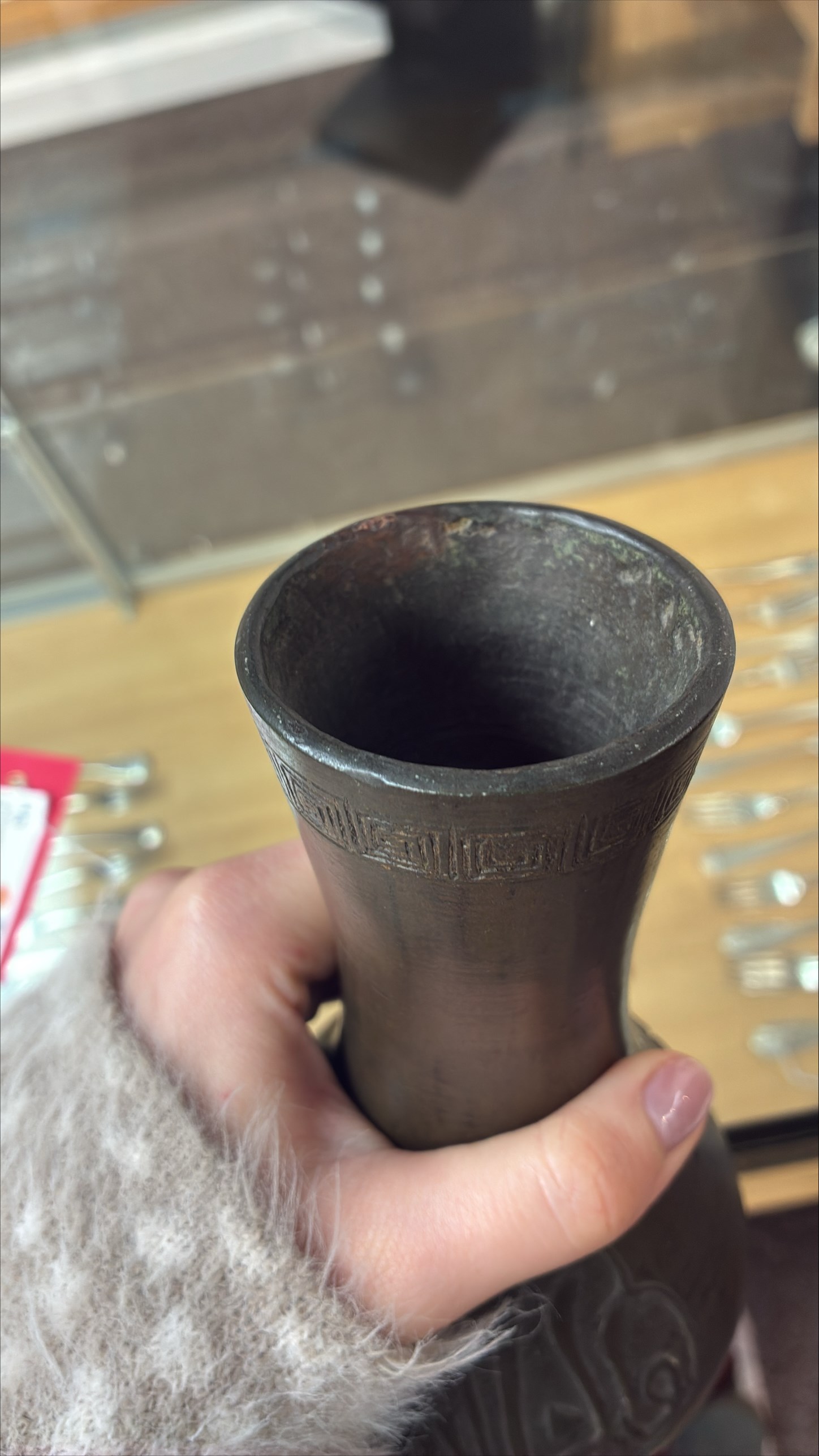 Chinese bronze vase, the cartouches containing Arabic characters on a granulated ground, unmarked H19cm