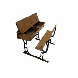Early 20th century school desk, pine and cast iron, two sectional with hinged lids, the irons marked ‘Addision Ltd.’