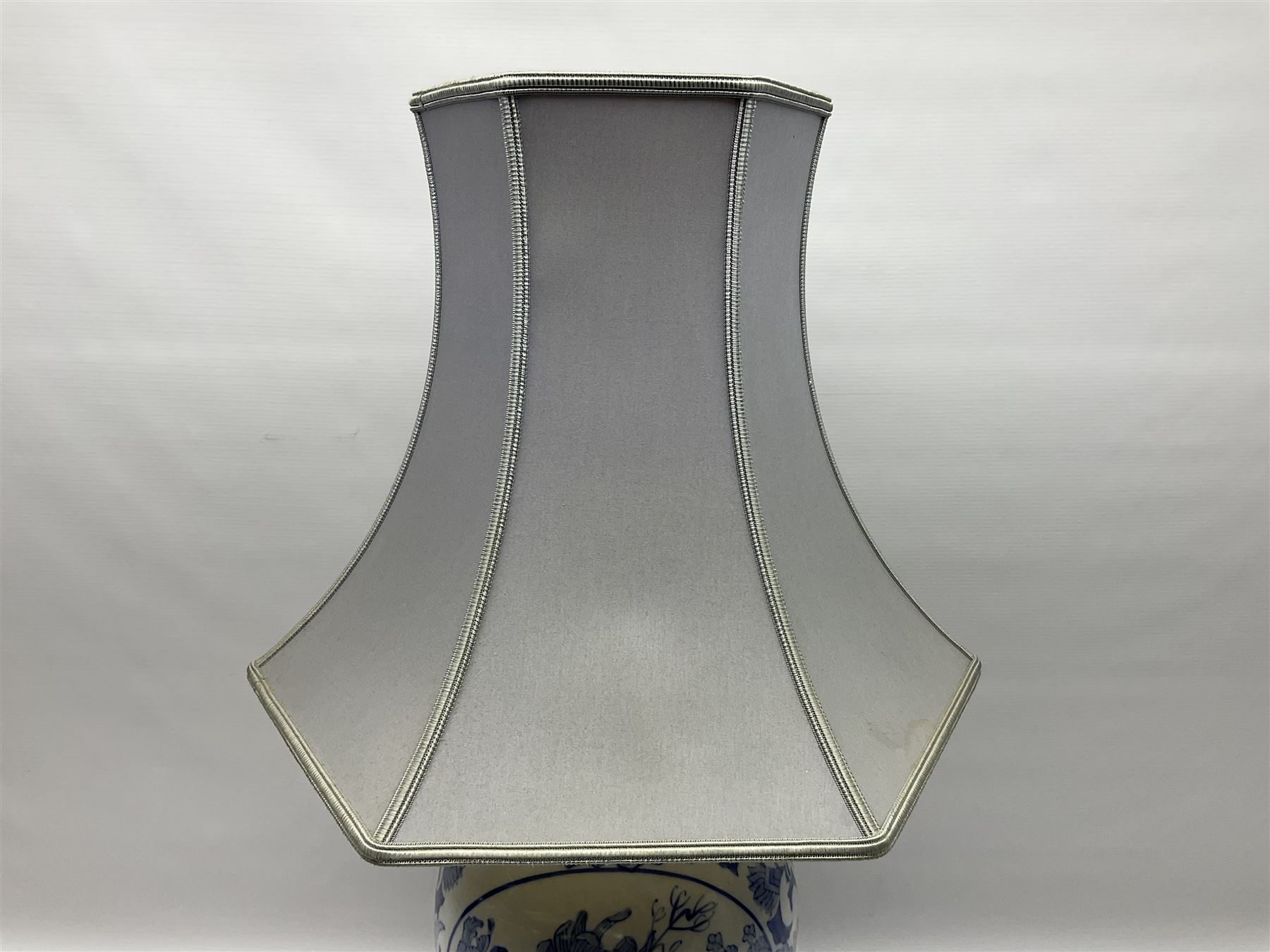 Chinese blue and white table lamp of baluster form, decorated with birds and floral displays, on hardwood base with shade, H78cm