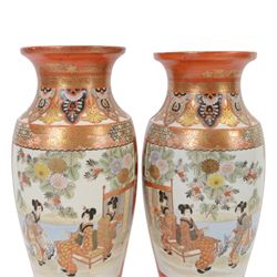 Pair of Japanese Katani vases, of baluster form decorated  with two panels depict a figures in a garden and peacocks amongst flowers, the rim with decorated borders including scrolls, flowers and Greek key design, with character marks beneath H36cm