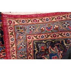  Kashmar red ground rug, central medallion, floral pattern repeating border, 290cm x 190cm  