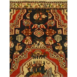  Eastern hand knotted blue ground rug, stepped central medallion, geometric field, repeating border, 157cm x 113cm  