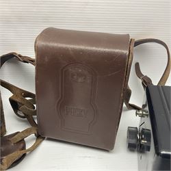 Franke & Heidecke Rolleicord twin lens camera, serial number 012706 with Heidoscop-Anastigmat f=7.5cm' lens and a 'Carl Zeiss Jena Triotar 1:4.5 f=7.5cm' lens, serial no 1474898, together with three similar cameras, including SEM TLR, serial no 420218, Ising Pucky box and Ferrania Elioflex, three in leather carry cases