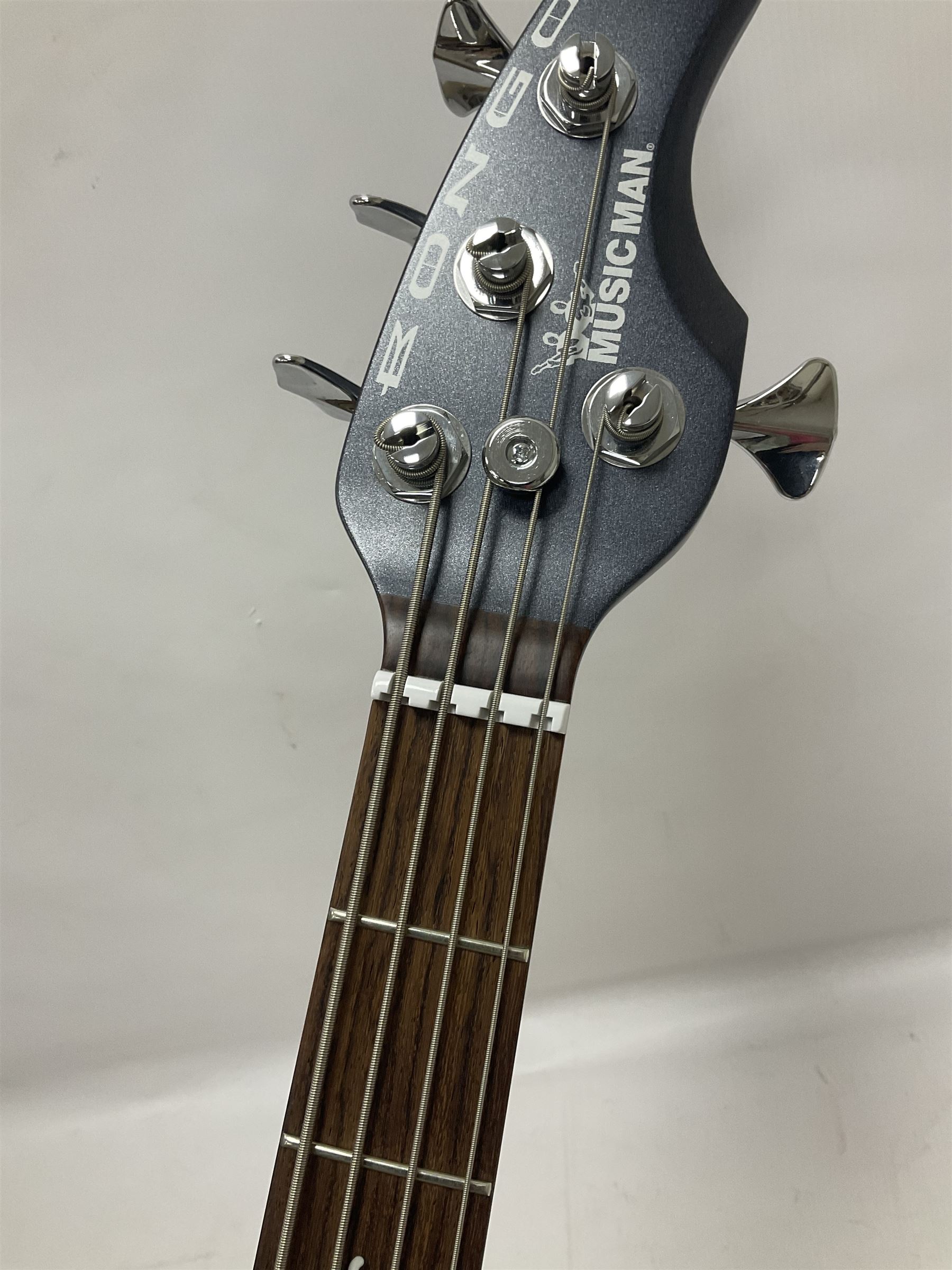 Music Man Bongo 4 string bass guitar, in sapphire black finish, serial no F42547, in black Music Man hard case, guitar L113cm