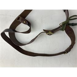 British Army Officers Sam Browne leather belt with shoulder strap; and webbing belt with Potter London Staybrite buckle for 19th Regiment of Foot (Green Howards) with various markings (2)
