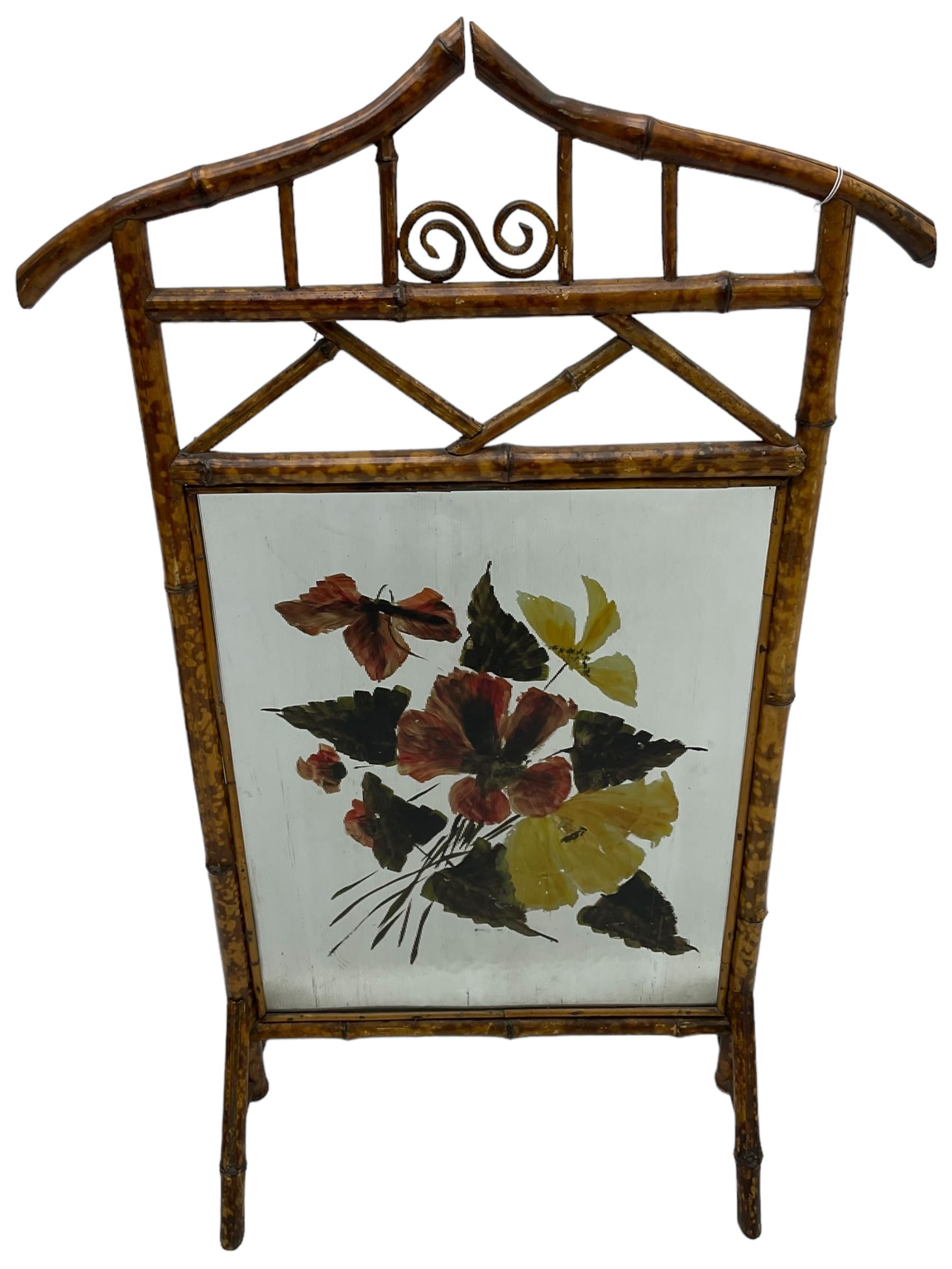 Victorian bamboo fire screen, pointed arched cresting rails over floral painted glass panel 